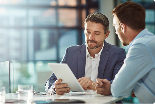 Businessmen discussing commercial property